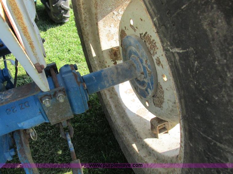 image for item I8927 Ford 1710 MFWD tractor