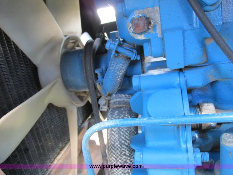 image for item I8927 Ford 1710 MFWD tractor