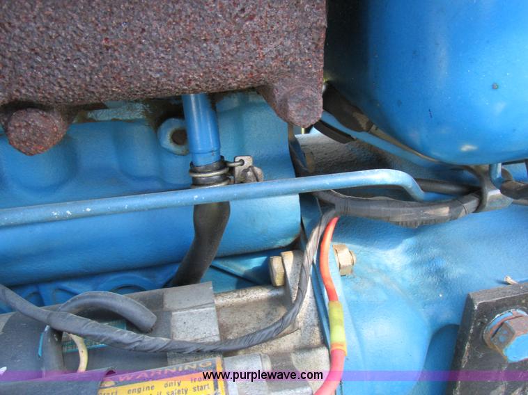 image for item I8927 Ford 1710 MFWD tractor