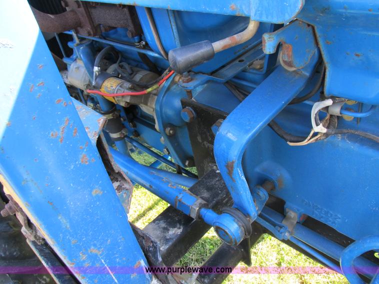 image for item I8927 Ford 1710 MFWD tractor