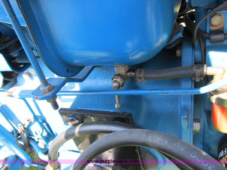 image for item I8927 Ford 1710 MFWD tractor