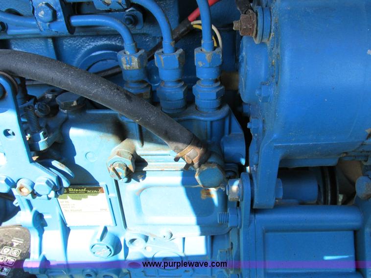 image for item I8927 Ford 1710 MFWD tractor