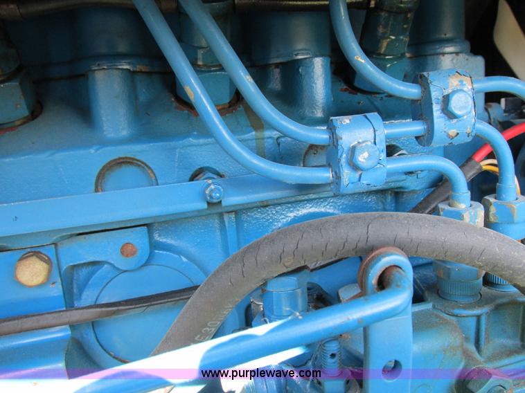 image for item I8927 Ford 1710 MFWD tractor