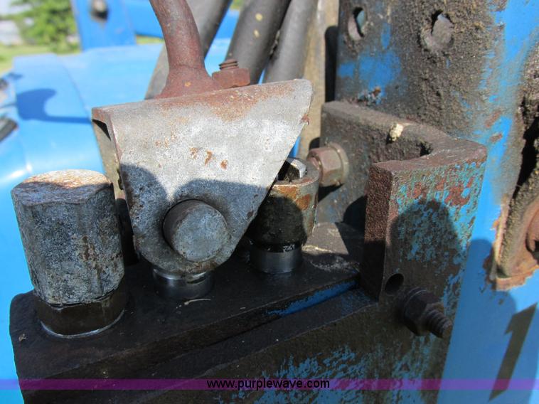 image for item I8927 Ford 1710 MFWD tractor