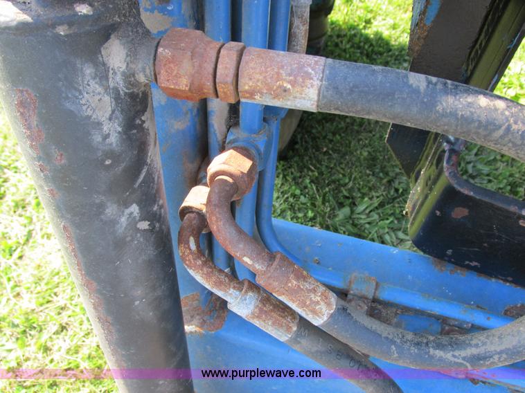 image for item I8927 Ford 1710 MFWD tractor