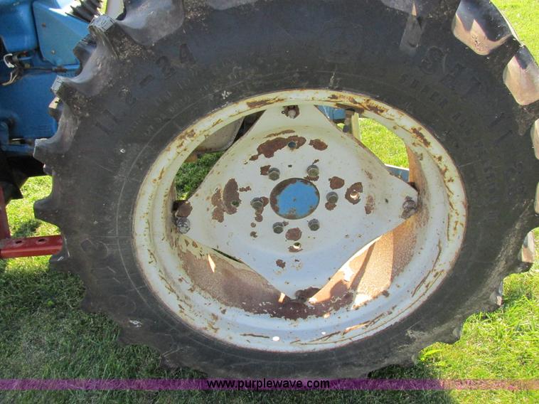 image for item I8927 Ford 1710 MFWD tractor