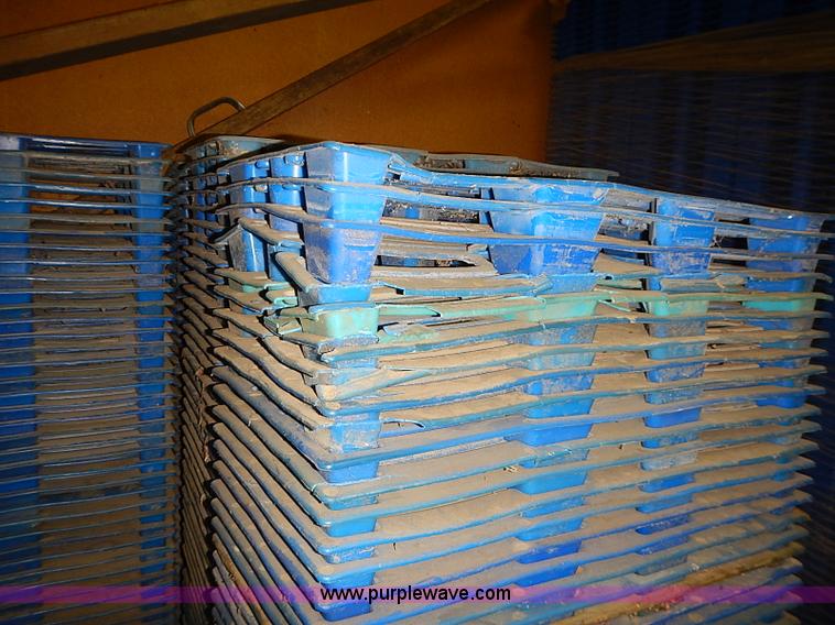 image for item J3059 Approximately 3,200 Agri plastic feed bag pallets