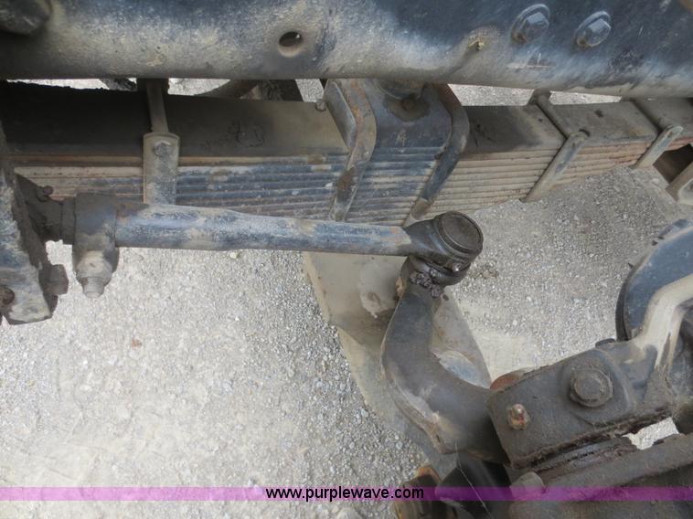 image for item D2145 1985 Mack DM686S roll off truck