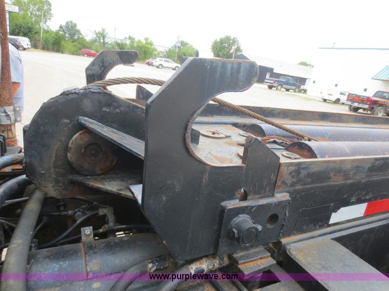 image for item D2145 1985 Mack DM686S roll off truck