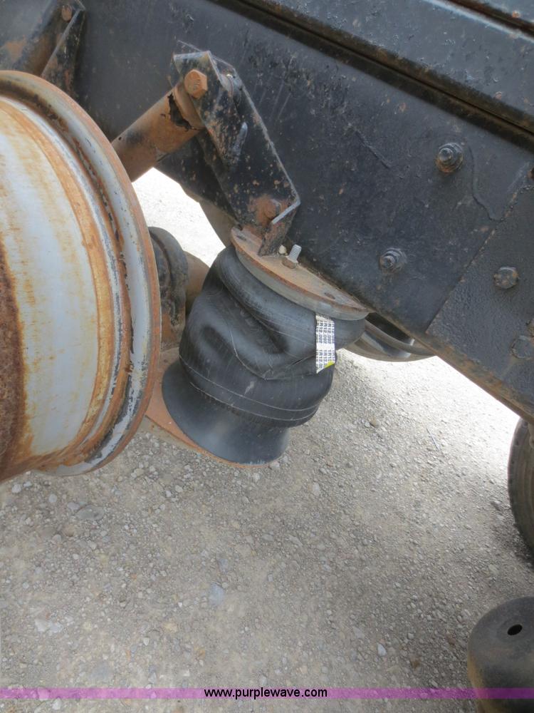 image for item D2145 1985 Mack DM686S roll off truck