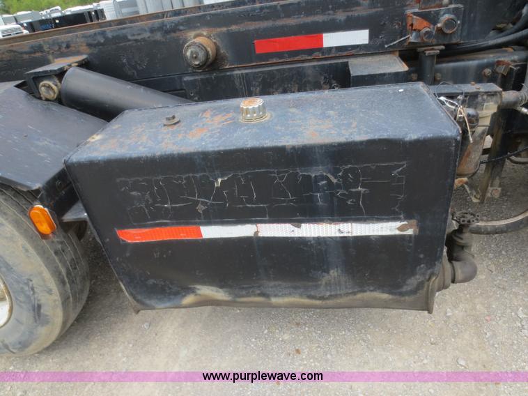 image for item D2145 1985 Mack DM686S roll off truck