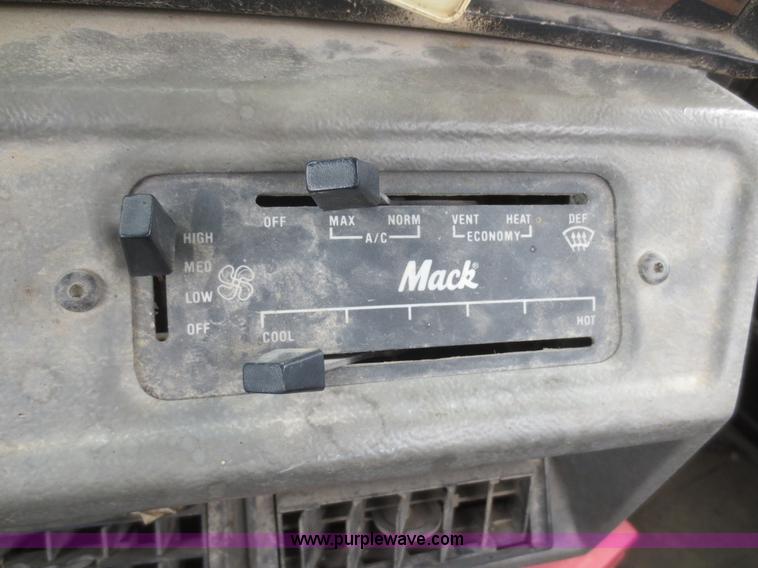 image for item D2145 1985 Mack DM686S roll off truck