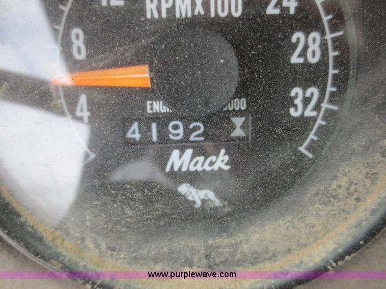 image for item D2145 1985 Mack DM686S roll off truck