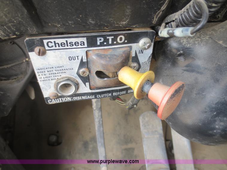 image for item D2145 1985 Mack DM686S roll off truck