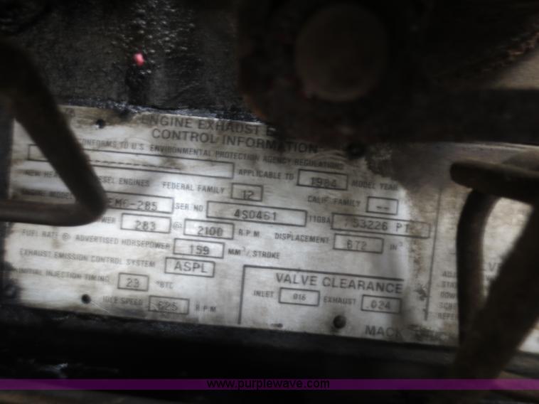 image for item D2145 1985 Mack DM686S roll off truck