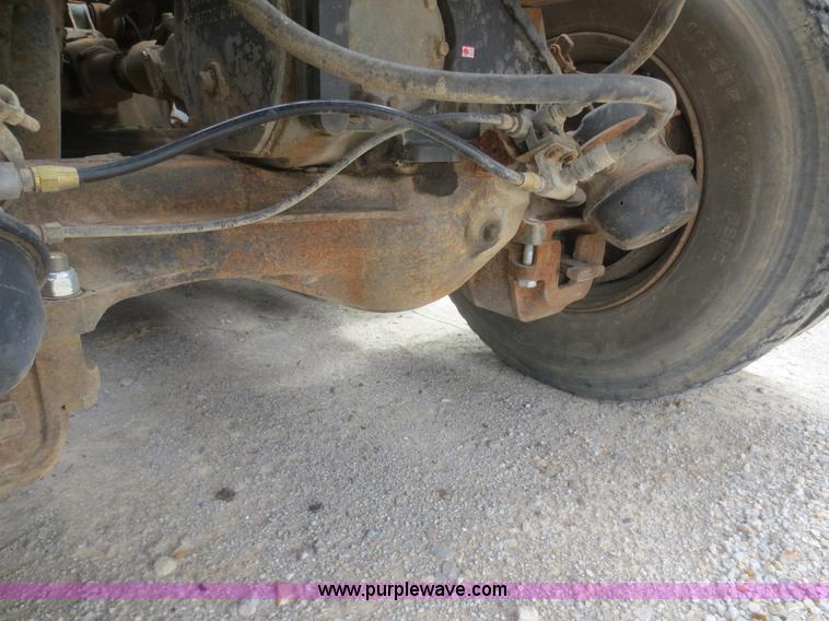 image for item D2145 1985 Mack DM686S roll off truck