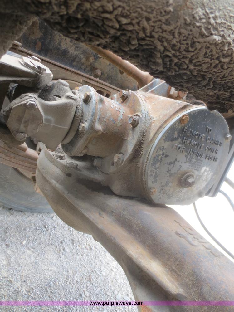 image for item D2145 1985 Mack DM686S roll off truck