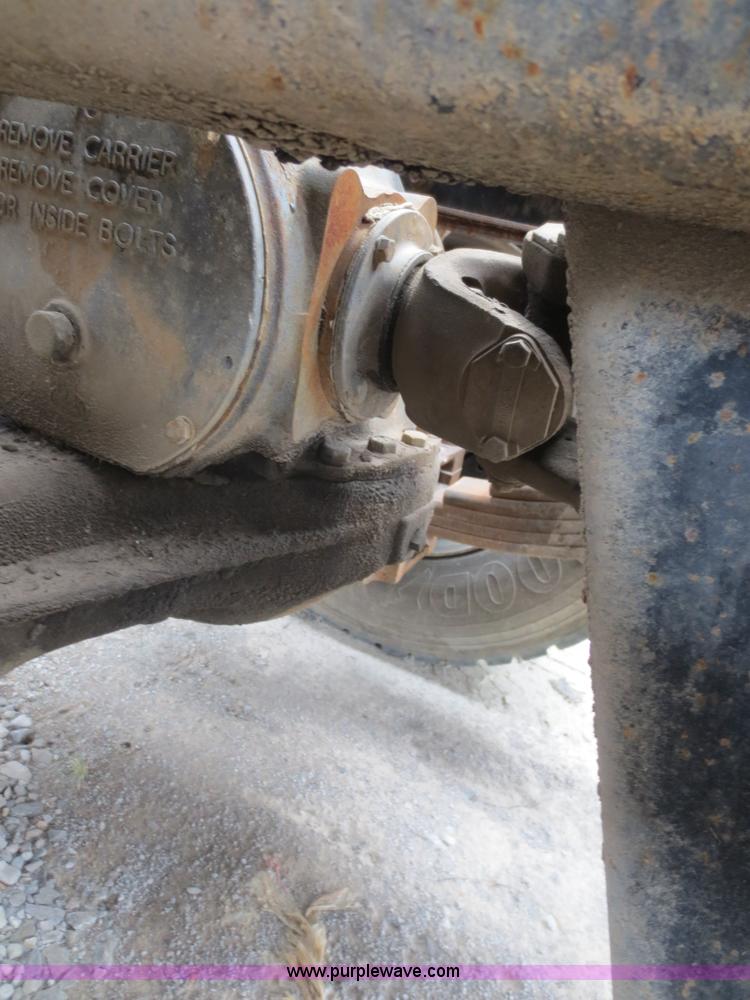 image for item D2145 1985 Mack DM686S roll off truck