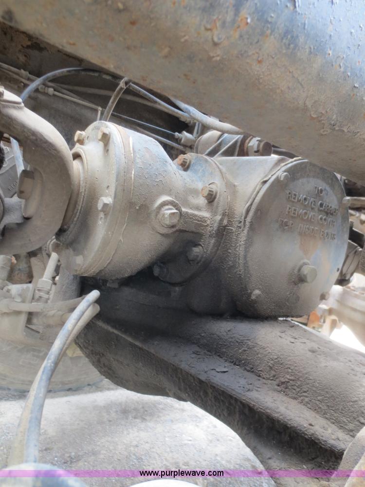 image for item D2145 1985 Mack DM686S roll off truck