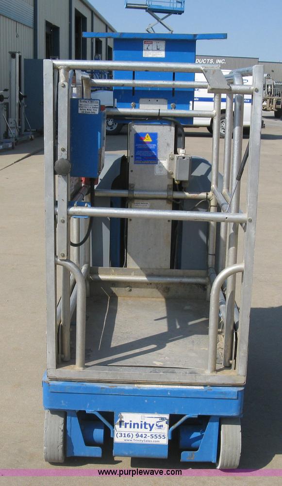 image for item E7987 2002 Genie GR15 runabout man lift