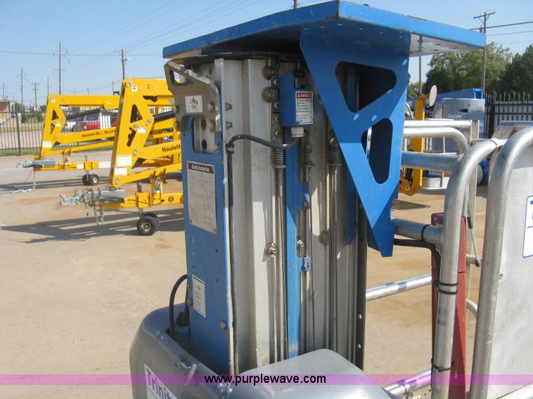 image for item E7987 2002 Genie GR15 runabout man lift