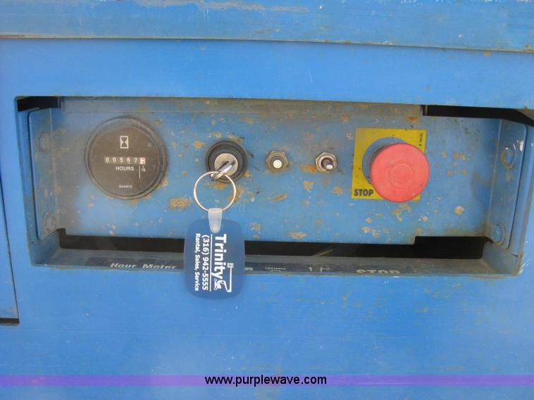 image for item E7987 2002 Genie GR15 runabout man lift