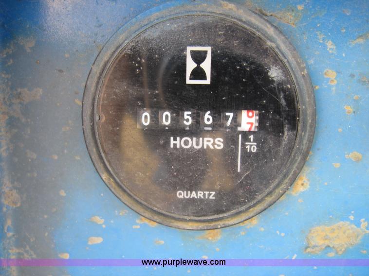 image for item E7987 2002 Genie GR15 runabout man lift