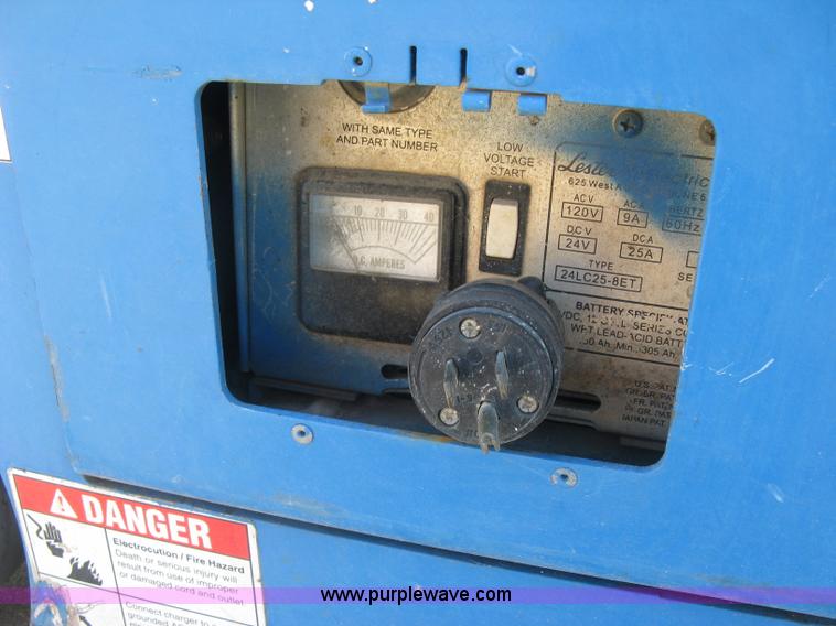 image for item E7987 2002 Genie GR15 runabout man lift