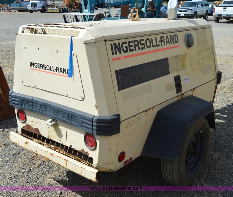image for item F8338 2000 Ingersoll Rand 185 air compressor