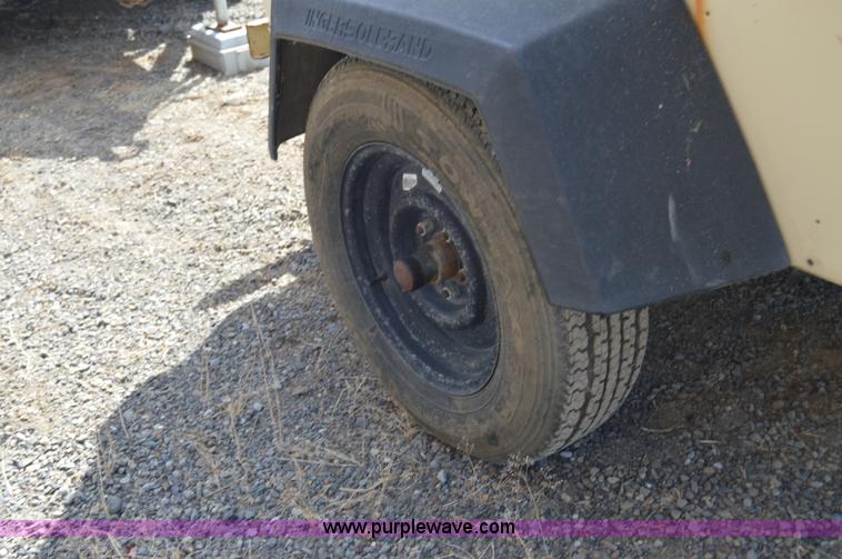 image for item F8338 2000 Ingersoll Rand 185 air compressor