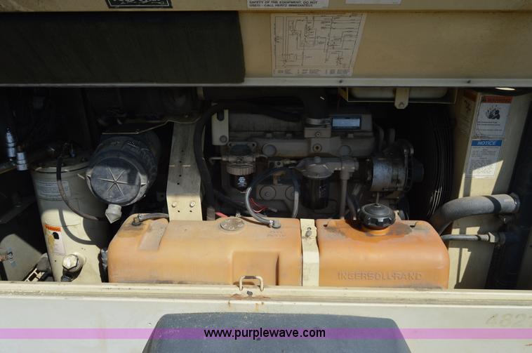 image for item F8338 2000 Ingersoll Rand 185 air compressor