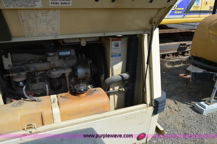 image for item F8338 2000 Ingersoll Rand 185 air compressor