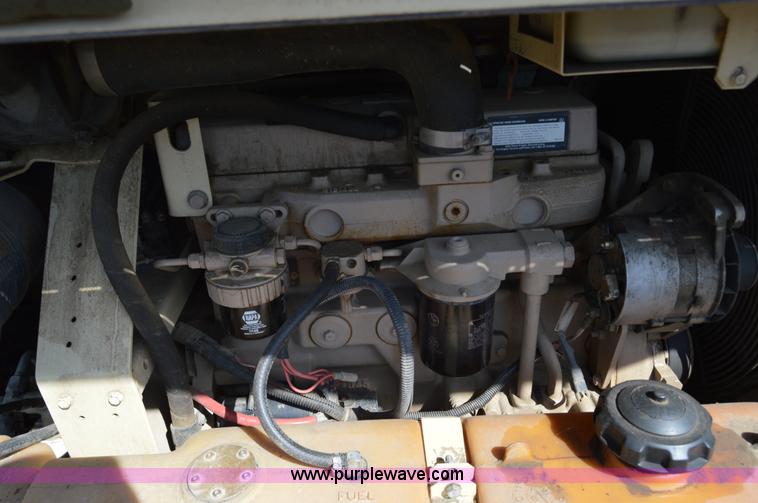 image for item F8338 2000 Ingersoll Rand 185 air compressor