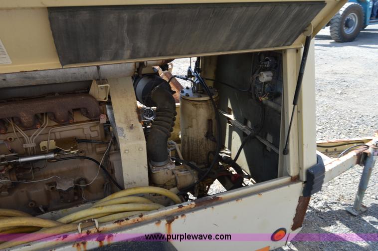 image for item F8338 2000 Ingersoll Rand 185 air compressor