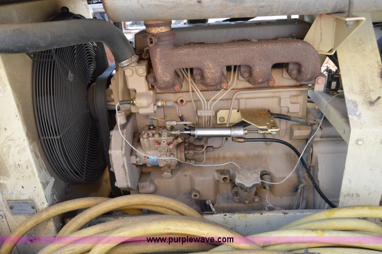 image for item F8338 2000 Ingersoll Rand 185 air compressor