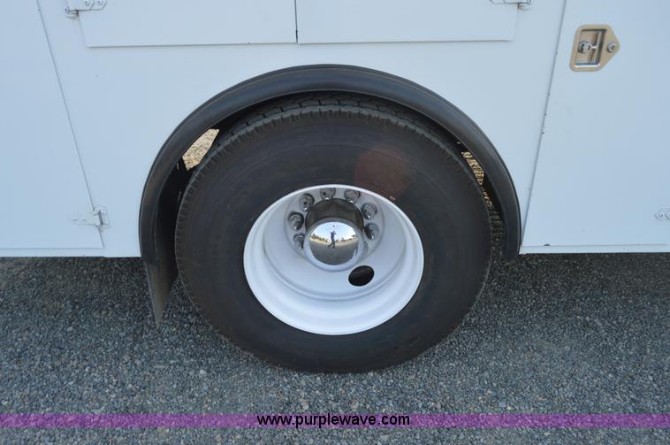 image for item F8345 2000 Freightliner FL70 service truck