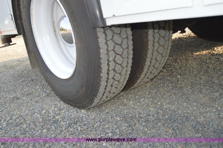 image for item F8345 2000 Freightliner FL70 service truck