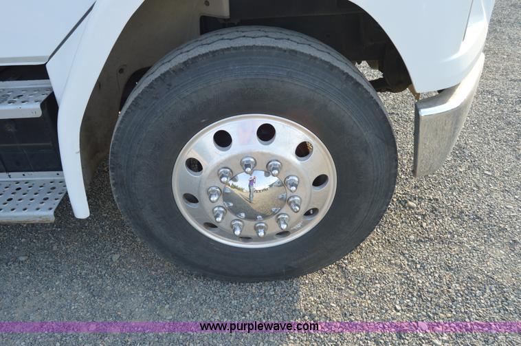 image for item F8345 2000 Freightliner FL70 service truck