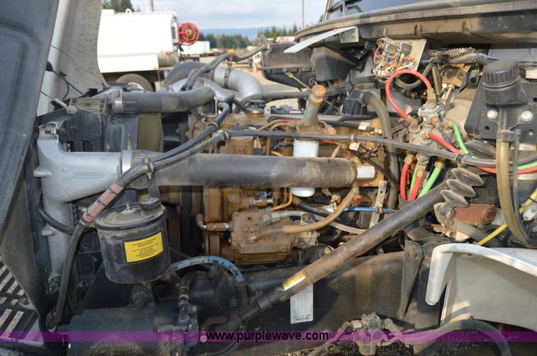 image for item F8345 2000 Freightliner FL70 service truck