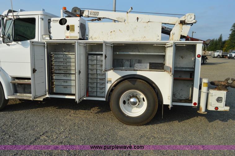 image for item F8345 2000 Freightliner FL70 service truck