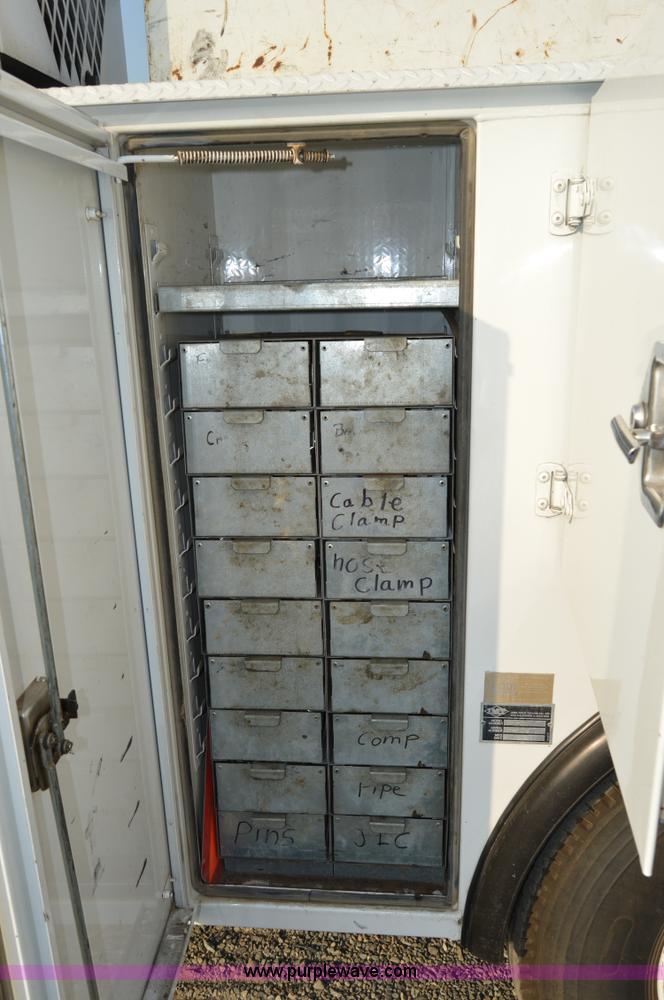 image for item F8345 2000 Freightliner FL70 service truck