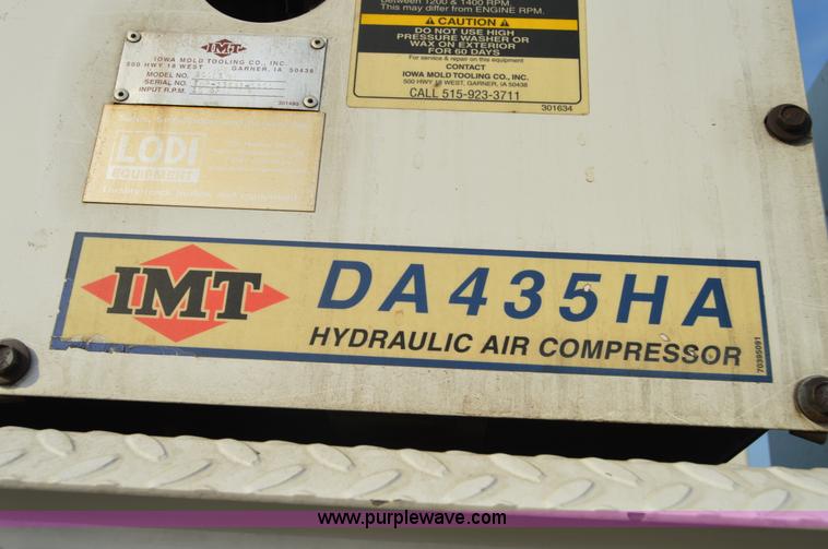 image for item F8345 2000 Freightliner FL70 service truck