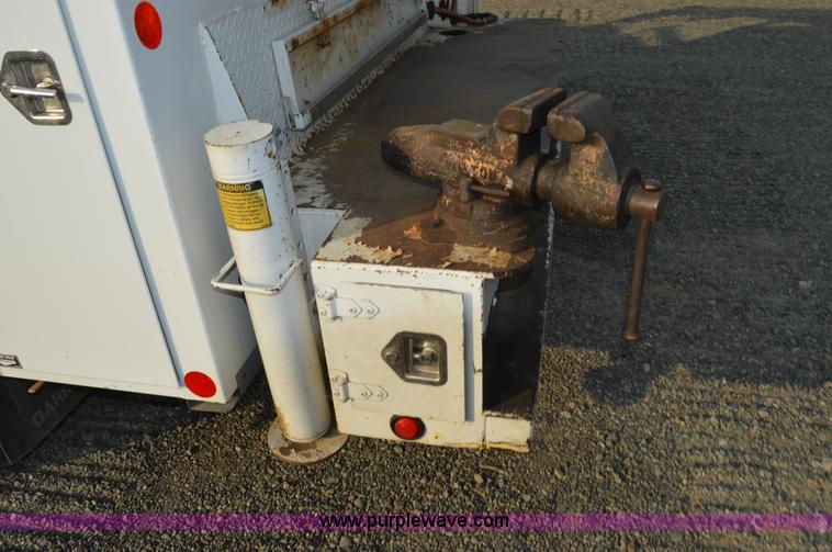 image for item F8345 2000 Freightliner FL70 service truck