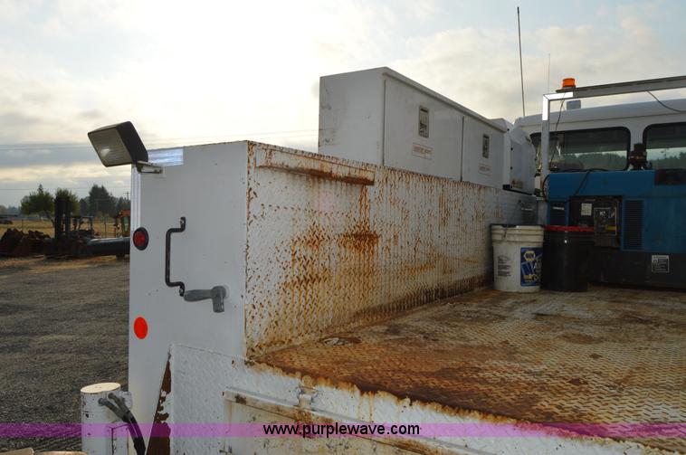 image for item F8345 2000 Freightliner FL70 service truck