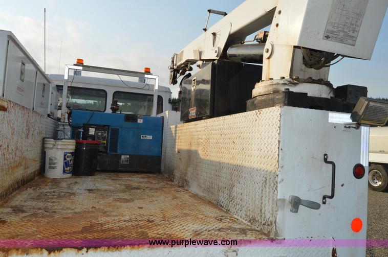 image for item F8345 2000 Freightliner FL70 service truck