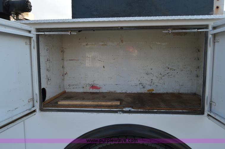 image for item F8345 2000 Freightliner FL70 service truck