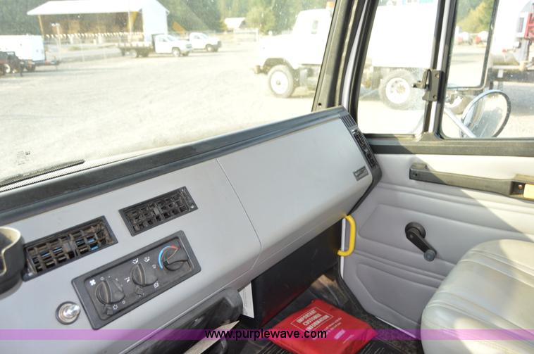 image for item F8345 2000 Freightliner FL70 service truck