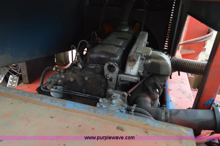 image for item F8352 1987 Manitoe R1134-4TC telehandler