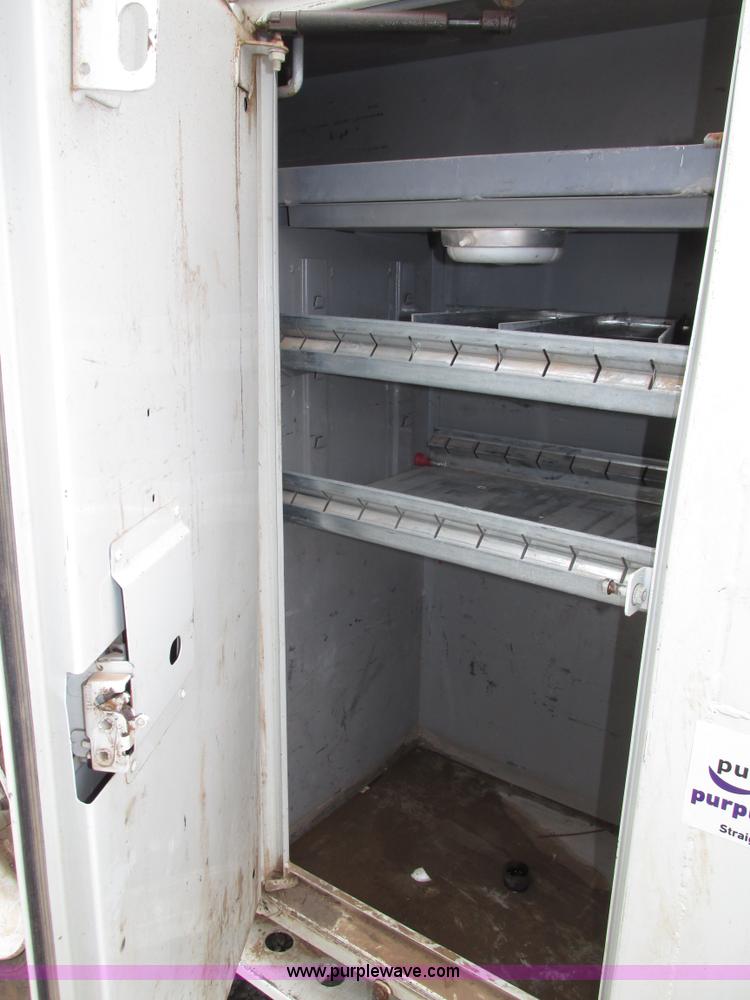 image for item G9935 2006 ALTEC L42M Boom lift on Reading Truck Body