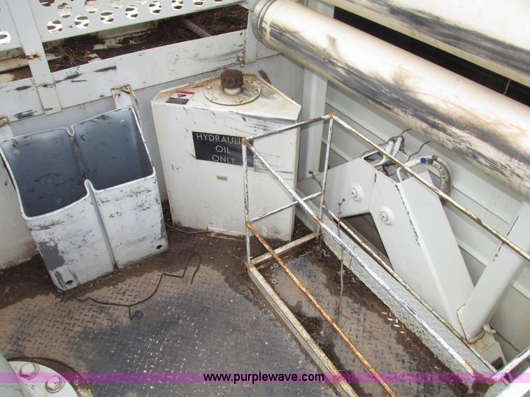 image for item G9935 2006 ALTEC L42M Boom lift on Reading Truck Body